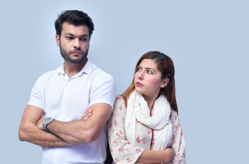 a man and woman posing for a picture