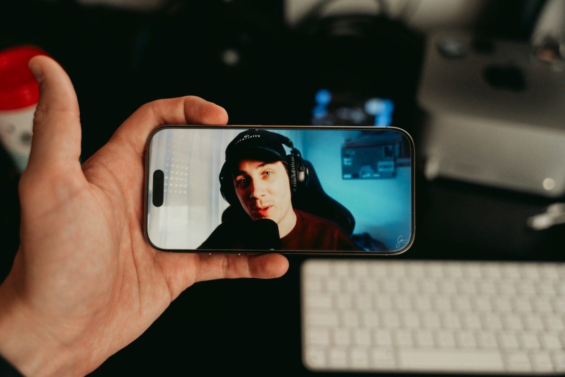 Person watching a live stream on their phone